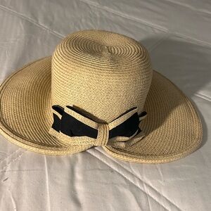 Elegant Tan Sun Hat with Black Bow